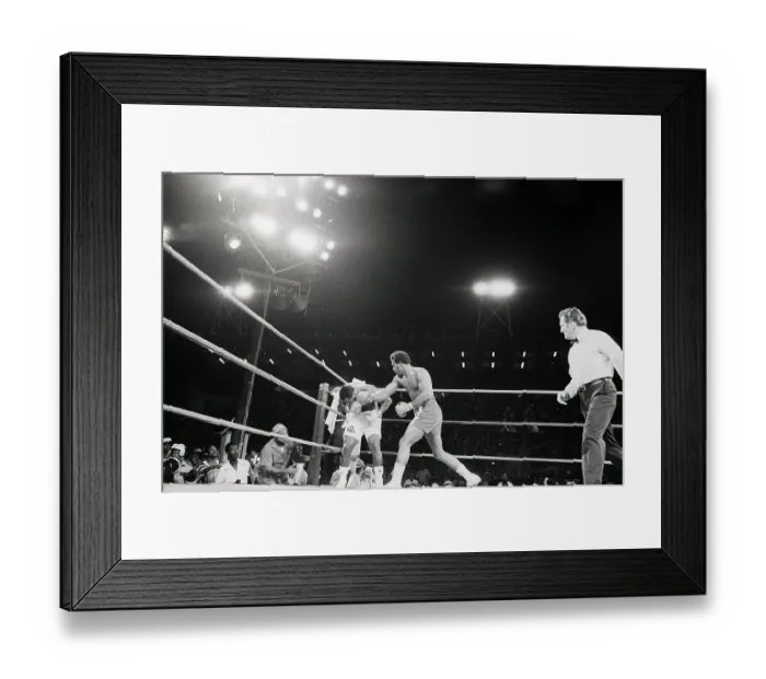 Framed Print : Joe Frazier Gets Hit By George Foreman Framed Print : Joe Frazier Gets Hit By George Foreman