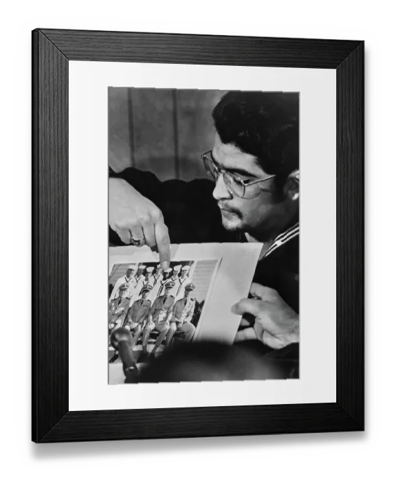 Framed Print : Man Points Out Sniper In Photo