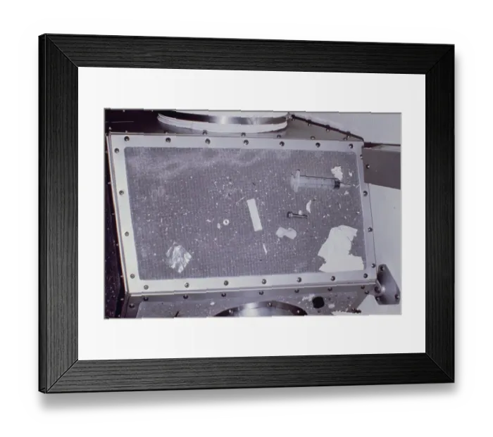 Framed Print : Close-up of screen covering air duct showing collected debris Framed Print : Close-up of screen covering air duct showing collected debris