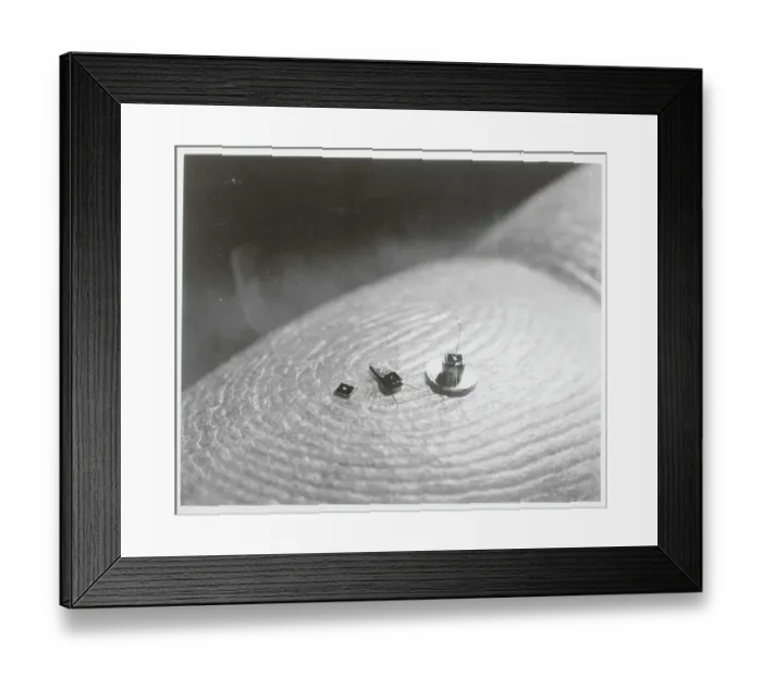 Framed Print : Finger Holding Microscopic Particles Framed Print : Finger Holding Microscopic Particles