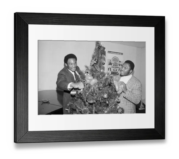 Framed Print : George Foreman and Joe Frazier Around Christmas Tree Framed Print : George Foreman and Joe Frazier Around Christmas Tree