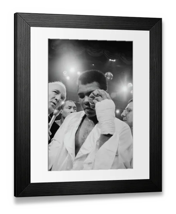 Framed Print : Muhammad Ali Holding Ice Bag on Eye Framed Print : Muhammad Ali Holding Ice Bag on Eye