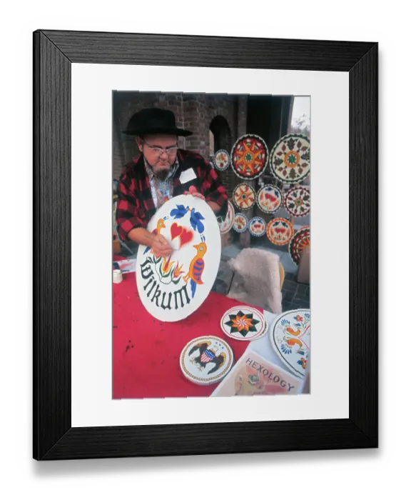 Framed Print : Amish Artisan Painting Hex Signs Framed Print : Amish Artisan Painting Hex Signs