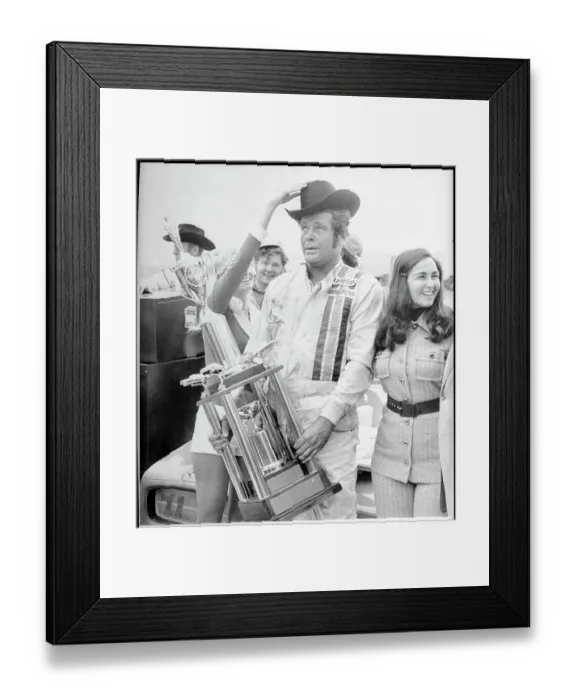 Framed Print : Buddy Baker Holding Trophy