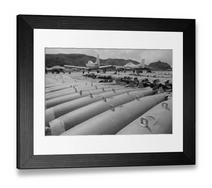 Framed Print : Bombs and Training Airplanes at Military Base in Laos Framed Print : Bombs and Training Airplanes at Military Base in Laos