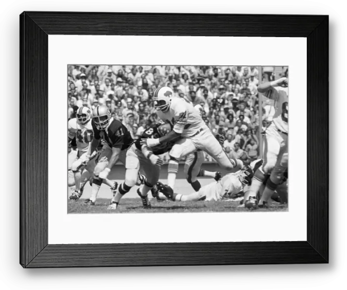 Framed Print : O.J. Simpson Gets Tackled by Gerald Irons