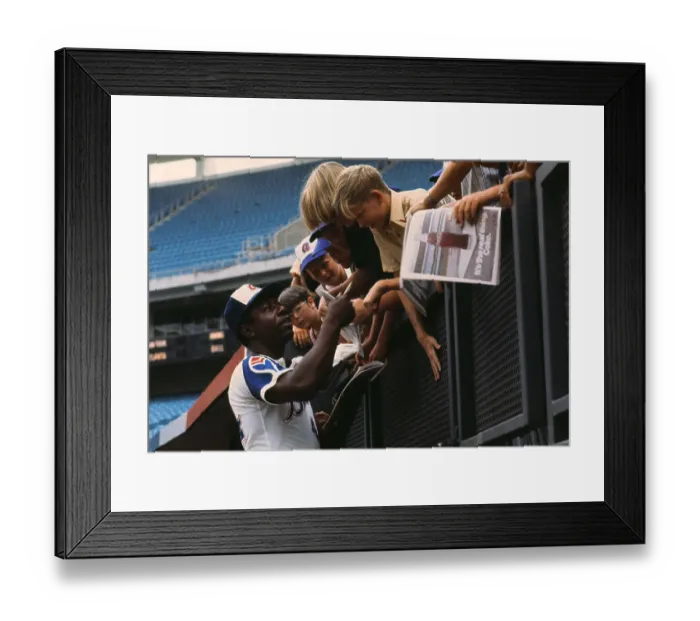 Framed Print : Hank Aaron Signing Autographs for Children in Stadium Framed Print : Hank Aaron Signing Autographs for Children in Stadium