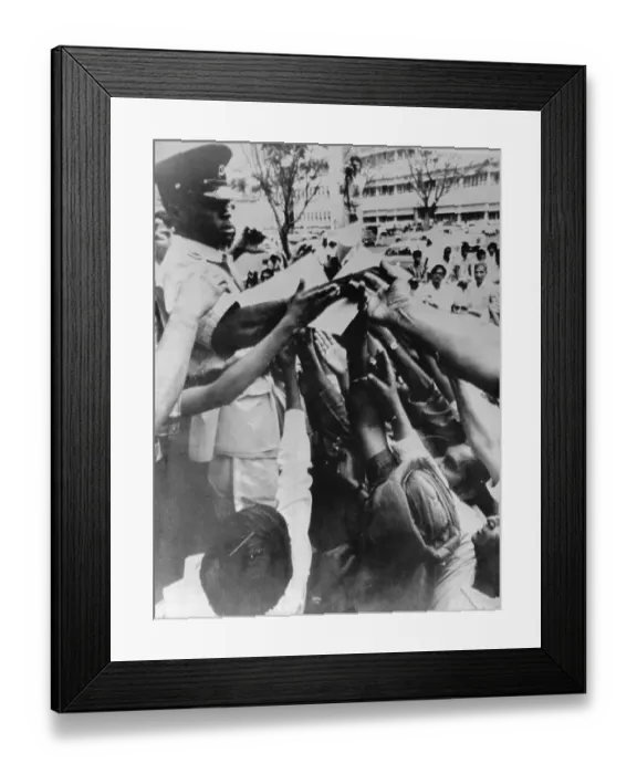 Framed Print : Hands Reaching for Immigration Applications Framed Print : Hands Reaching for Immigration Applications