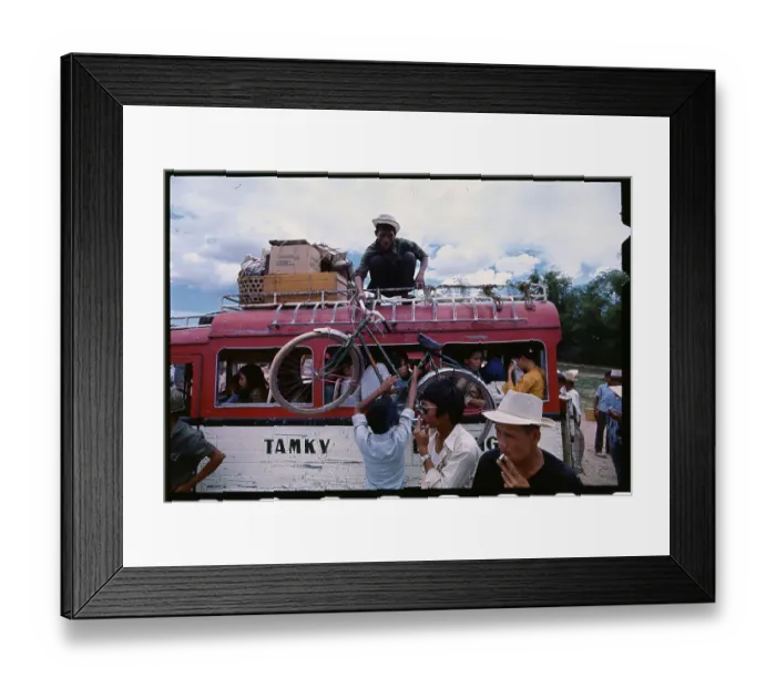 Framed Print : Vietnamese Refugees Boarding Bus Framed Print : Vietnamese Refugees Boarding Bus