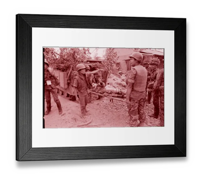 Framed Print : Soldier on Stretcher Gives Peace Sign Framed Print : Soldier on Stretcher Gives Peace Sign