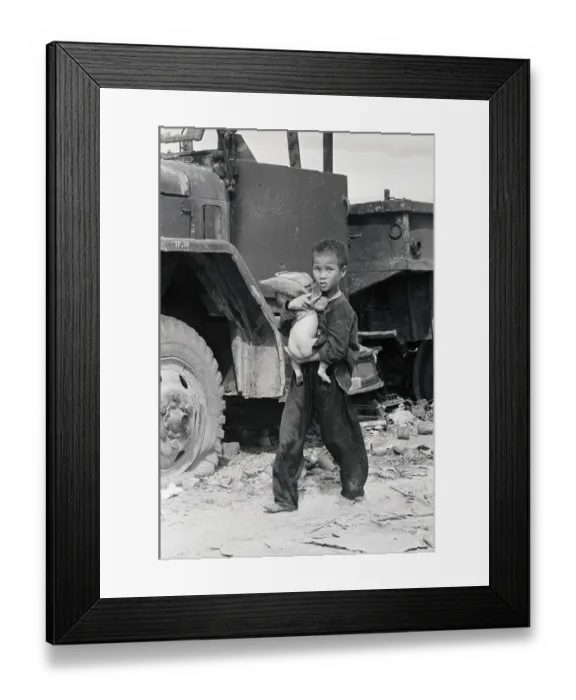 Framed Print : Vietnamese Boy Carrying Sister Framed Print : Vietnamese Boy Carrying Sister