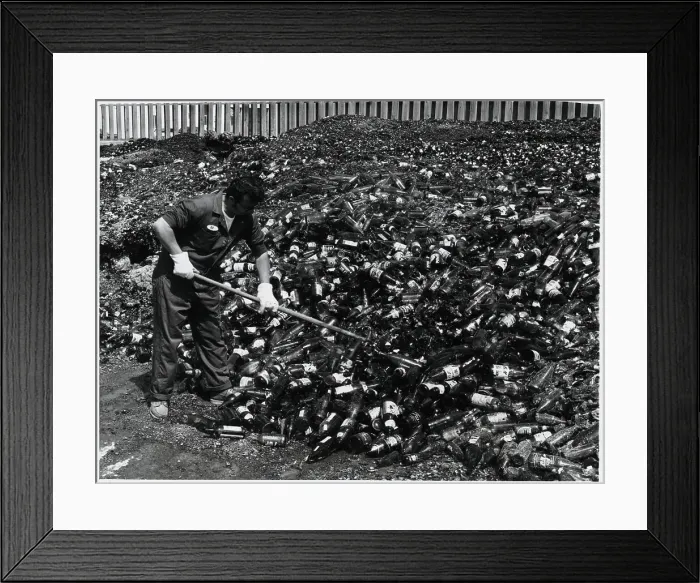 Framed Print : Man Tending Pile of Glass at Reclamation Framed Print : Man Tending Pile of Glass at Reclamation