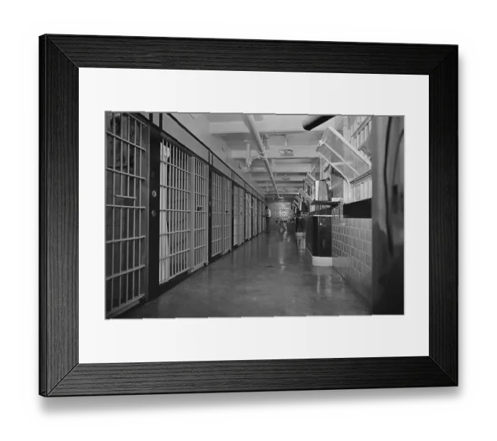 Framed Print : Guard Standing in Hallway of Prison Framed Print : Guard Standing in Hallway of Prison