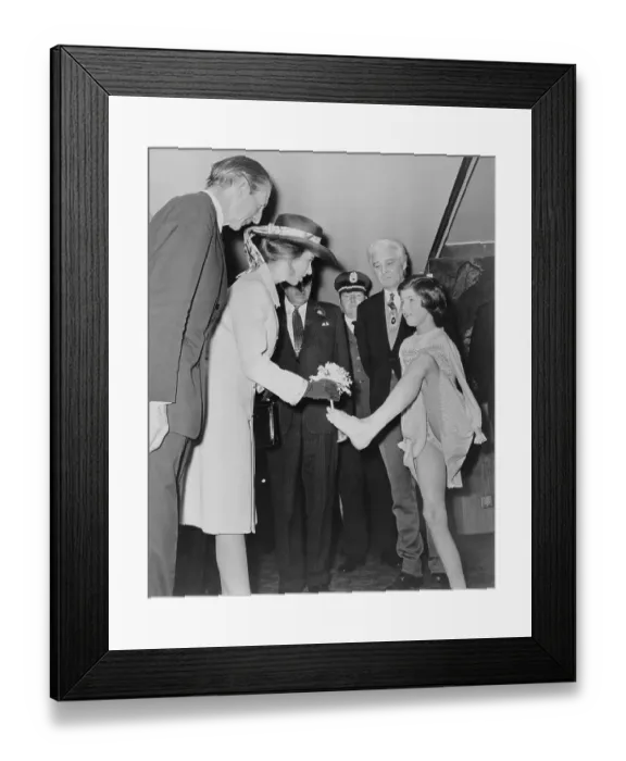 Framed Print : Girl Presenting Bouquet with Her Foot Framed Print : Girl Presenting Bouquet with Her Foot
