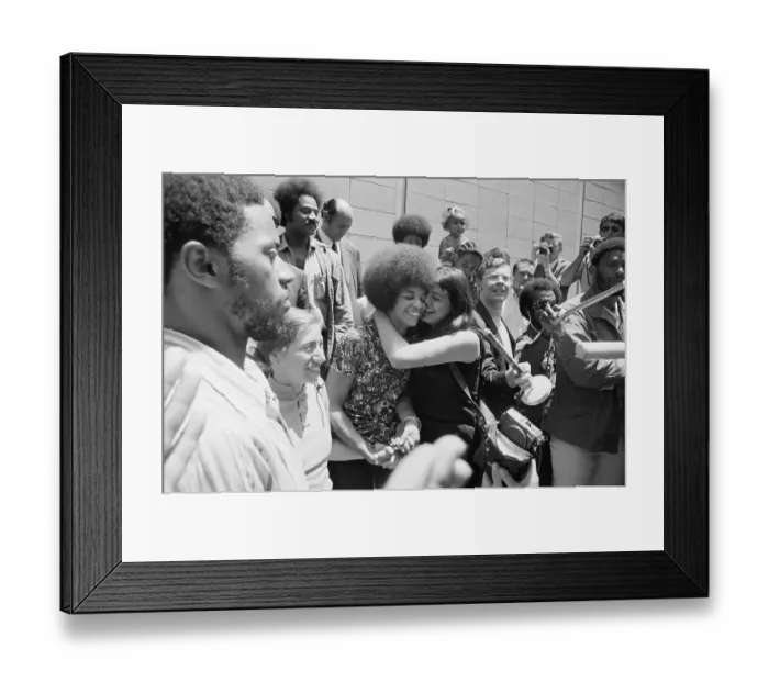 Framed Print : Victoia Machado Hugging Angela Davis Framed Print : Victoia Machado Hugging Angela Davis