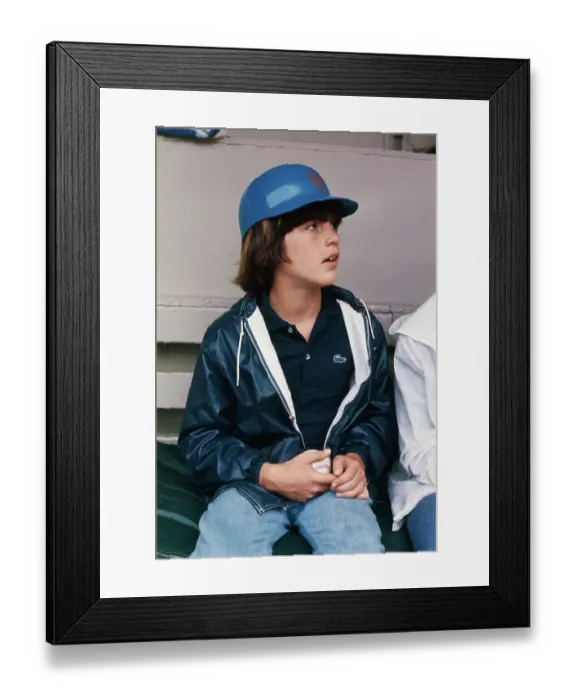 Framed Print : Young John F. Kennedy, Jr. Wearing Batting Helmet