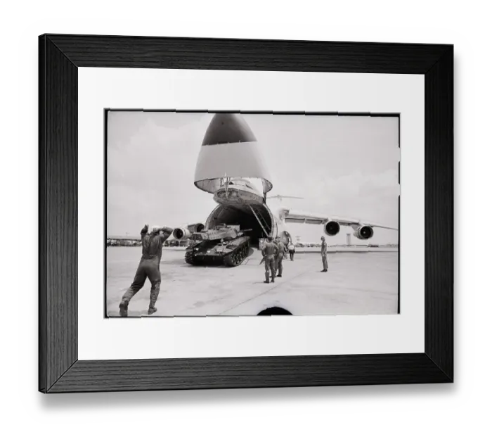 Framed Print : M-41 Tank Is Unloaded From Cargo Plane Framed Print : M-41 Tank Is Unloaded From Cargo Plane