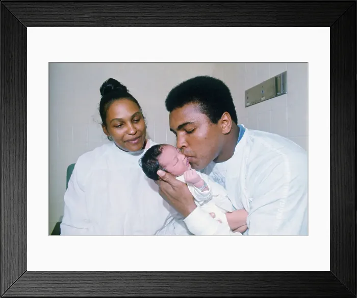 Framed Print : Muhammad Ali Kissing His Newborn Son Framed Print : Muhammad Ali Kissing His Newborn Son