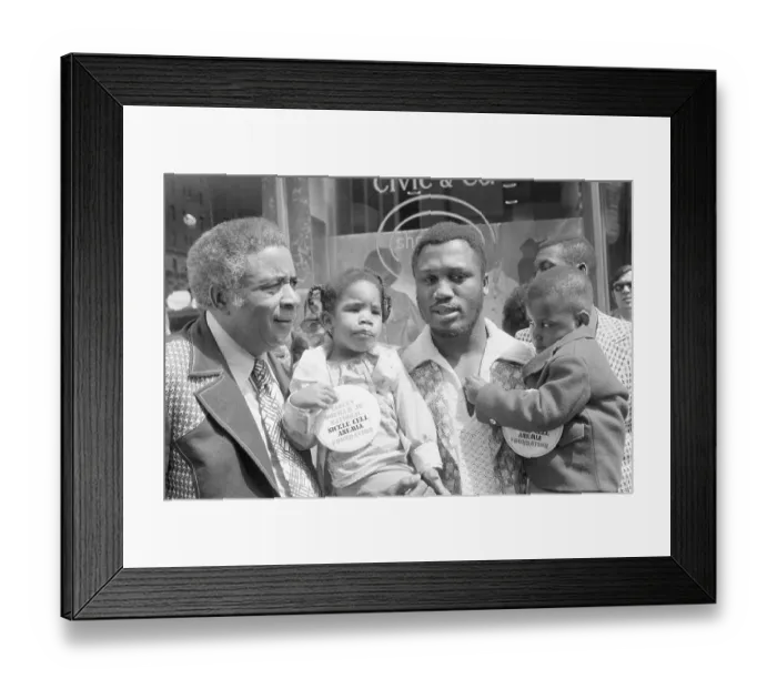 Framed Print : Joe Frazier Holds Two Kids with Sickle Cell Framed Print : Joe Frazier Holds Two Kids with Sickle Cell