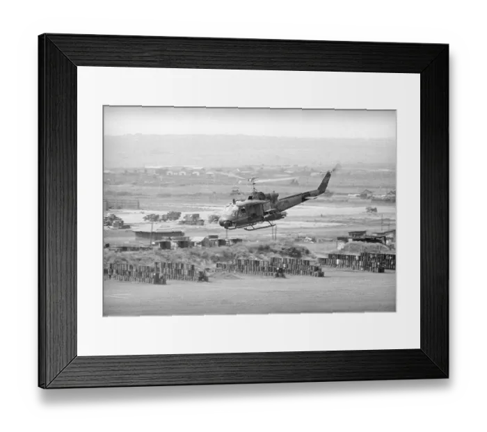 Framed Print : Helicopter Flying over Land Site Framed Print : Helicopter Flying over Land Site