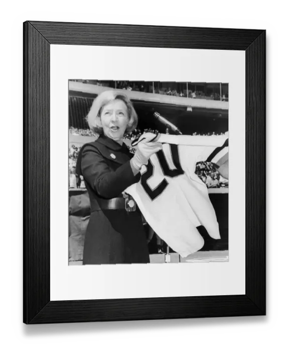 Framed Print : Eve Traynor holding her husband's jersey Framed Print : Eve Traynor holding her husband's jersey
