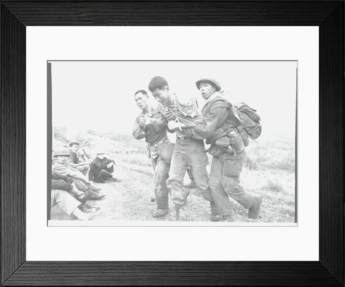 Framed Print : ARVN Soldiers Aiding A Comrade Framed Print : ARVN Soldiers Aiding A Comrade