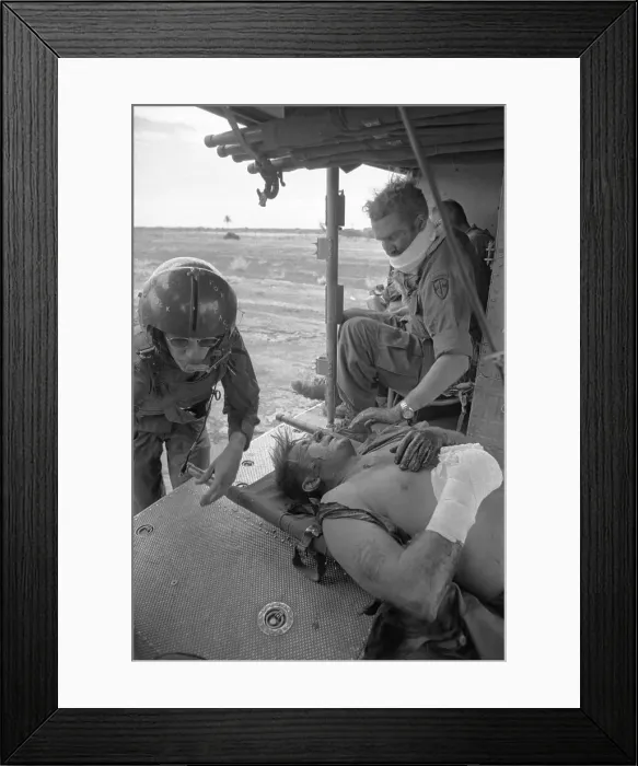 Framed Print : Injured Americans Being put on Helicopter Framed Print : Injured Americans Being put on Helicopter