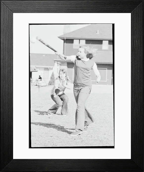 Framed Print : Young Softball Player with Artificial Limb in Batting Action Framed Print : Young Softball Player with Artificial Limb in Batting Action