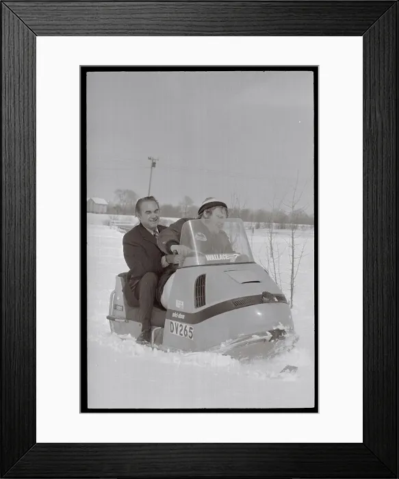 Framed Print : George Wallace Riding in Snowmobile Framed Print : George Wallace Riding in Snowmobile