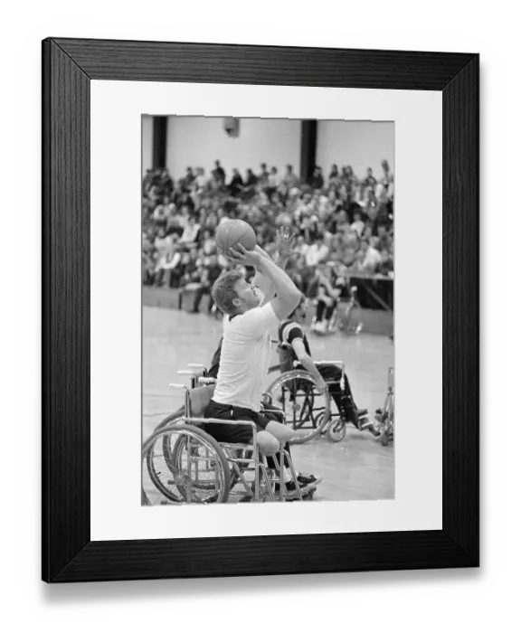 Framed Print : Man Shooting Basket From Wheelchair Framed Print : Man Shooting Basket From Wheelchair