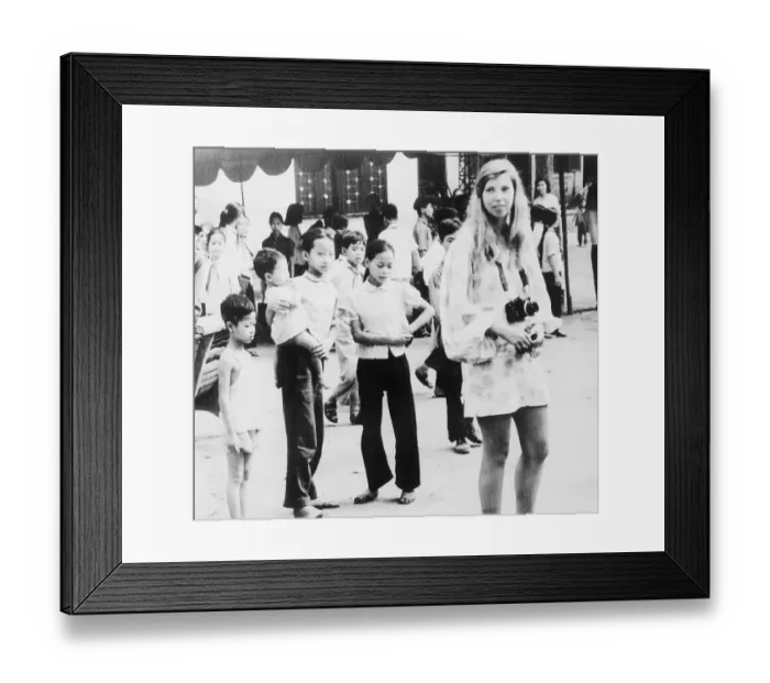 Framed Print : Girls Looking at Reporter Tracy Wood