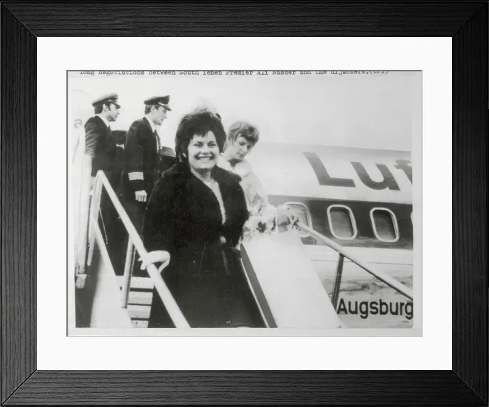 Framed Print : Passengers Walking out of Airplane