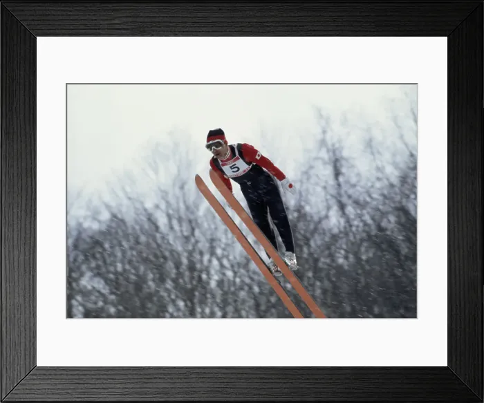 Framed Print : Competing in Ski Jump Event