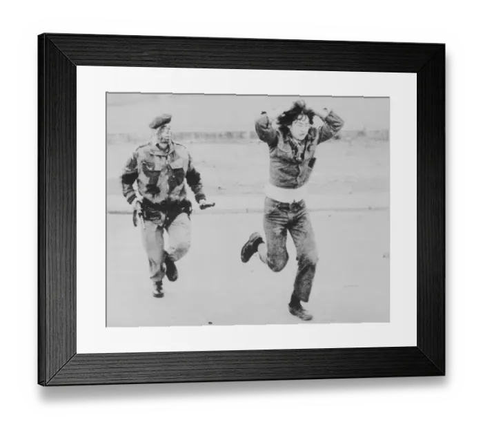 Framed Print : Soldier Rounding Up Demonstrator Framed Print : Soldier Rounding Up Demonstrator