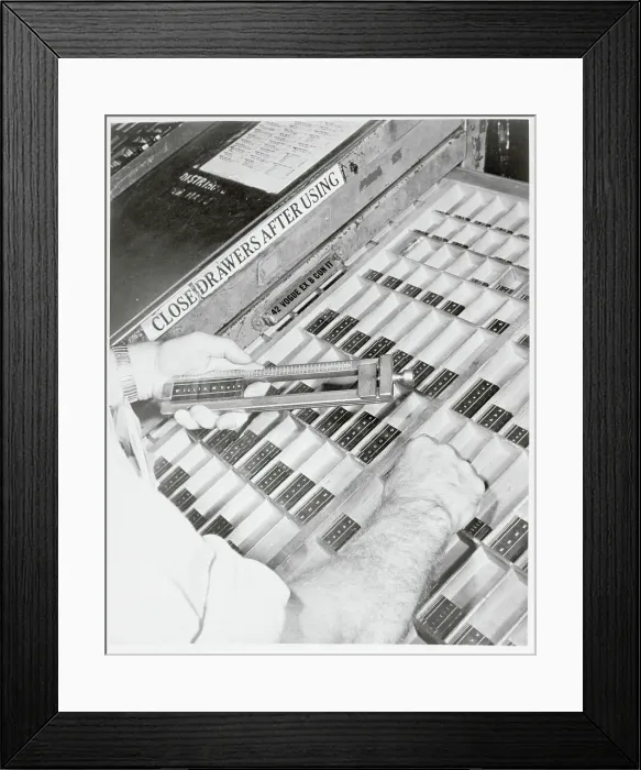 Framed Print : Worker Choosing Typeset Letters Framed Print : Worker Choosing Typeset Letters