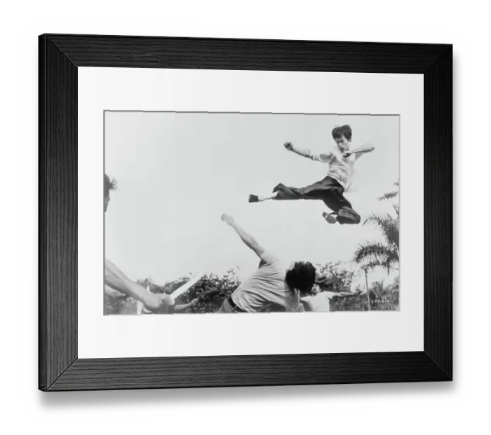 Framed Print : Bruce Lee Jumping in the Air Framed Print : Bruce Lee Jumping in the Air