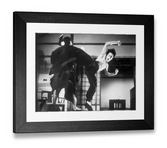 Framed Print : Bruce Lee Demonstrating a Kung-Fu Kick Framed Print : Bruce Lee Demonstrating a Kung-Fu Kick
