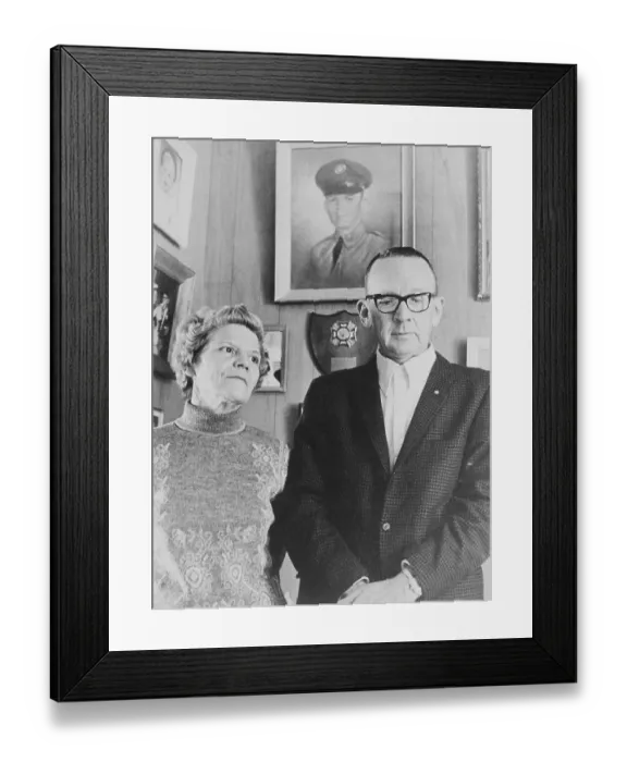 Framed Print : Parents Below Picture of Slain Son Framed Print : Parents Below Picture of Slain Son