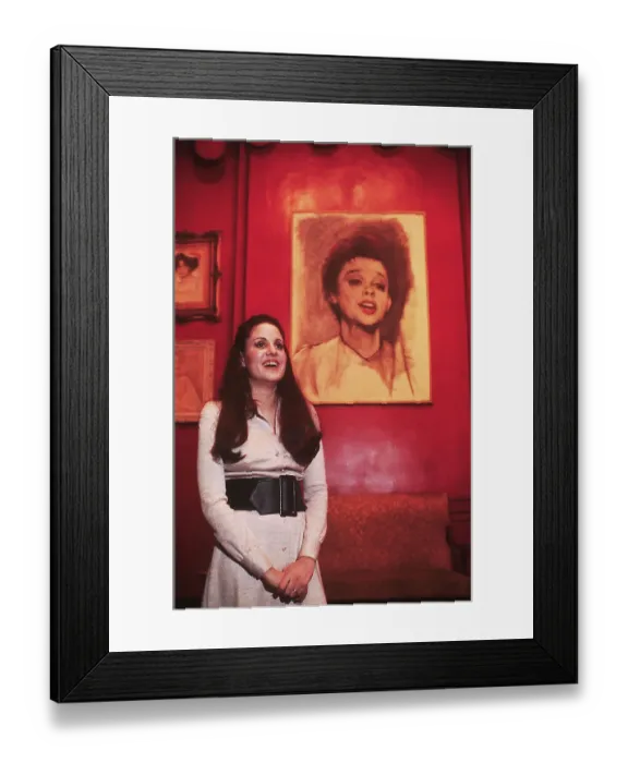 Framed Print : Lorna Luft with Portrait of Judy Garland Framed Print : Lorna Luft with Portrait of Judy Garland