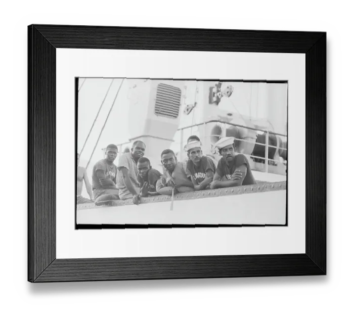Framed Print : Crew Men Leaning On Rescue Boat