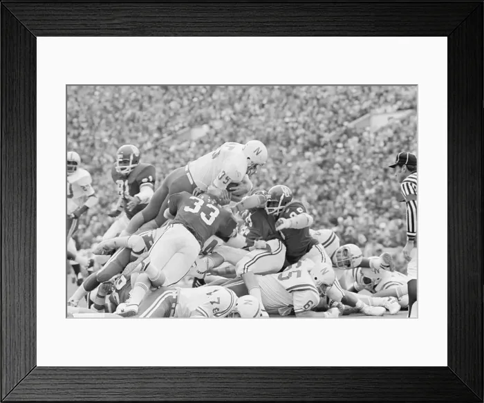 Framed Print : Nebraska's Players in Huddle During Football Game Framed Print : Nebraska's Players in Huddle During Football Game