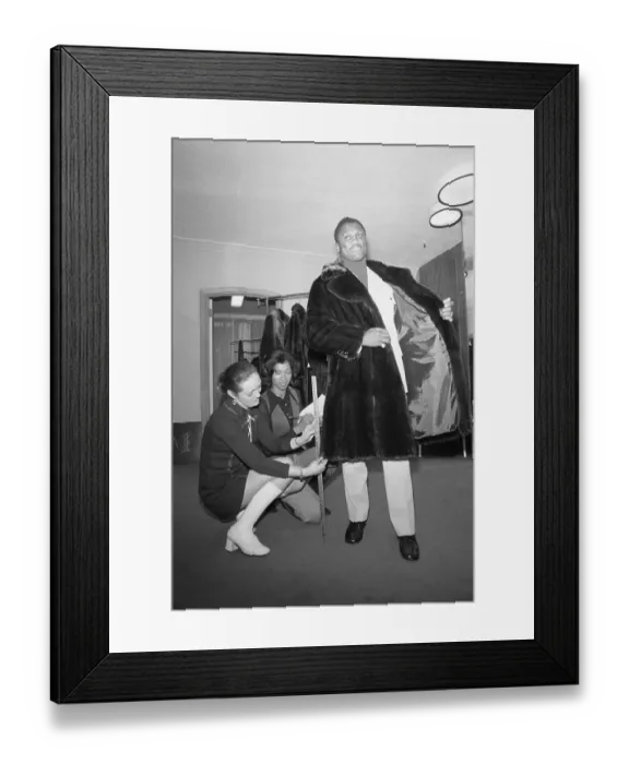 Framed Print : Joe Frazier Trying On Coat Framed Print : Joe Frazier Trying On Coat