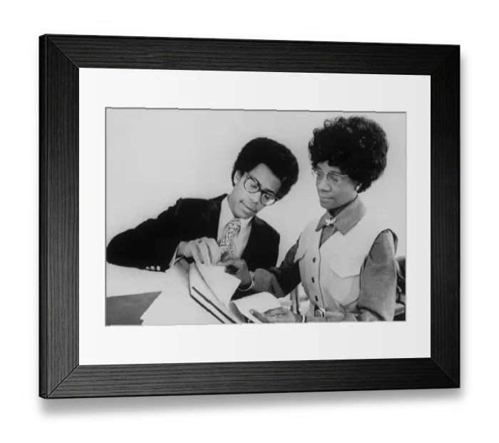Framed Print : Thaddeus Garrett Showing Shirley Chisholm a Report Framed Print : Thaddeus Garrett Showing Shirley Chisholm a Report