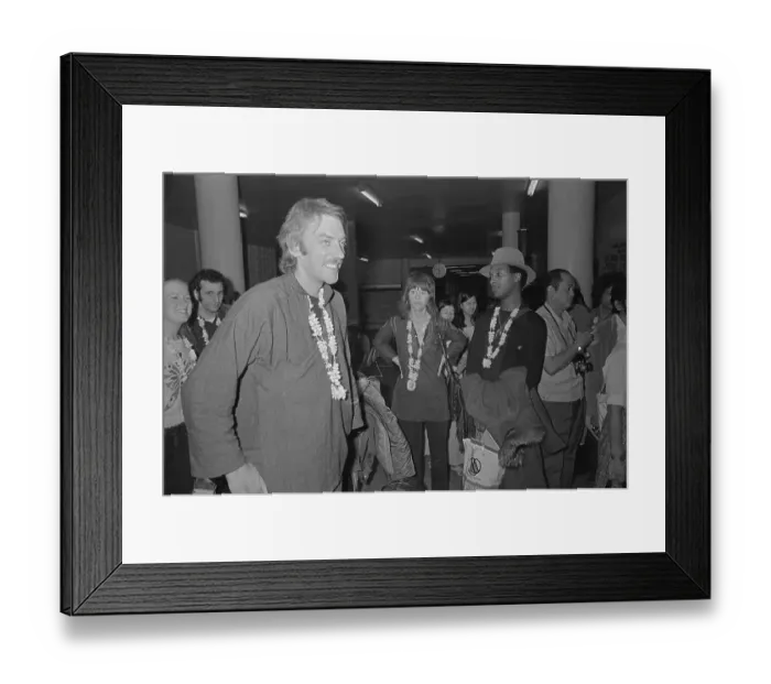 Framed Print : Donald Sutherland and Jane Fonda Standing with Others