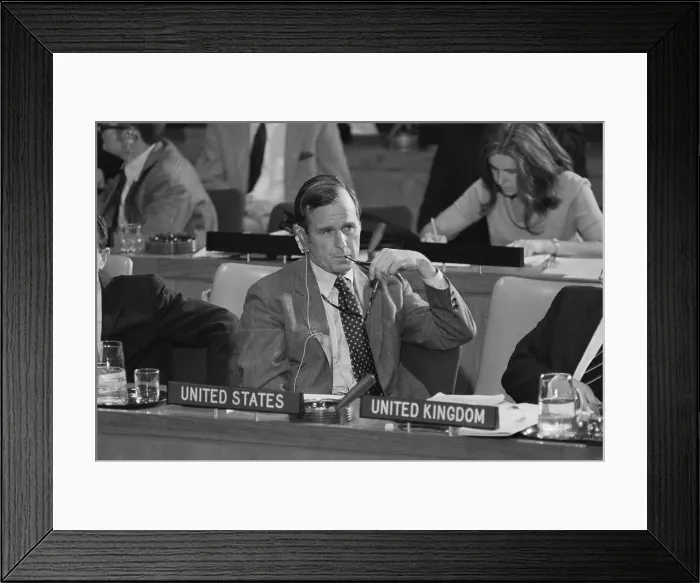 Framed Print : George Bush Biting His Glasses Framed Print : George Bush Biting His Glasses