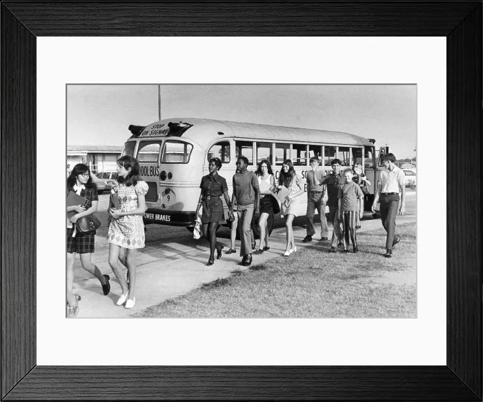 Framed Print : Female Students Walk From Bus To School Framed Print : Female Students Walk From Bus To School