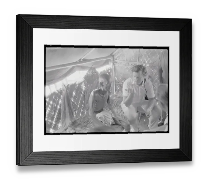 Framed Print : Edward Kennedy Interviewing a Refugee Framed Print : Edward Kennedy Interviewing a Refugee