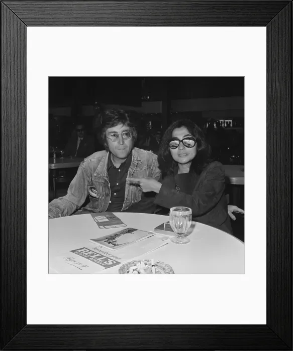 Framed Print : Yoko Ono and John Lennon Pose at Airport Framed Print : Yoko Ono and John Lennon Pose at Airport