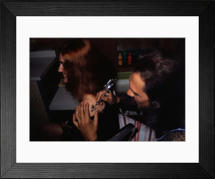 Framed Print : Lyle Tuttle Applying Tattoo Framed Print : Lyle Tuttle Applying Tattoo