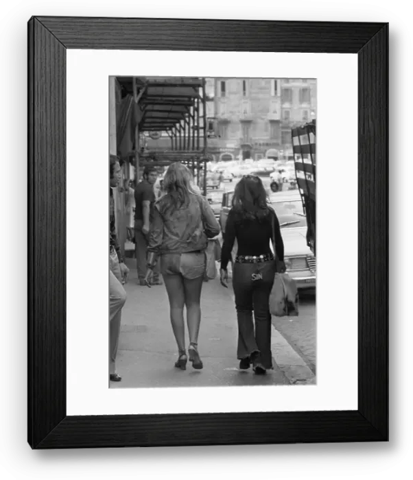Framed Print : Young Woman Wearing Patchwork Shorts